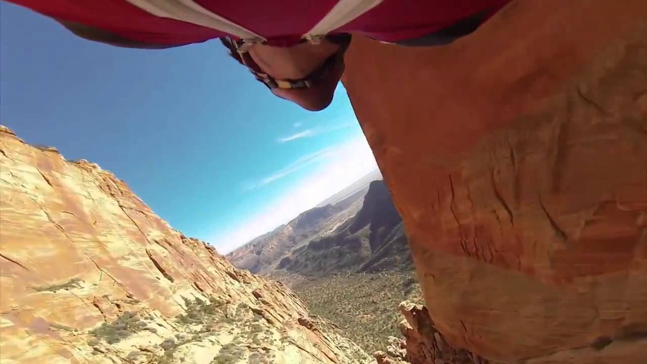 Marshall Miller Flies Through A Narrow Canyon