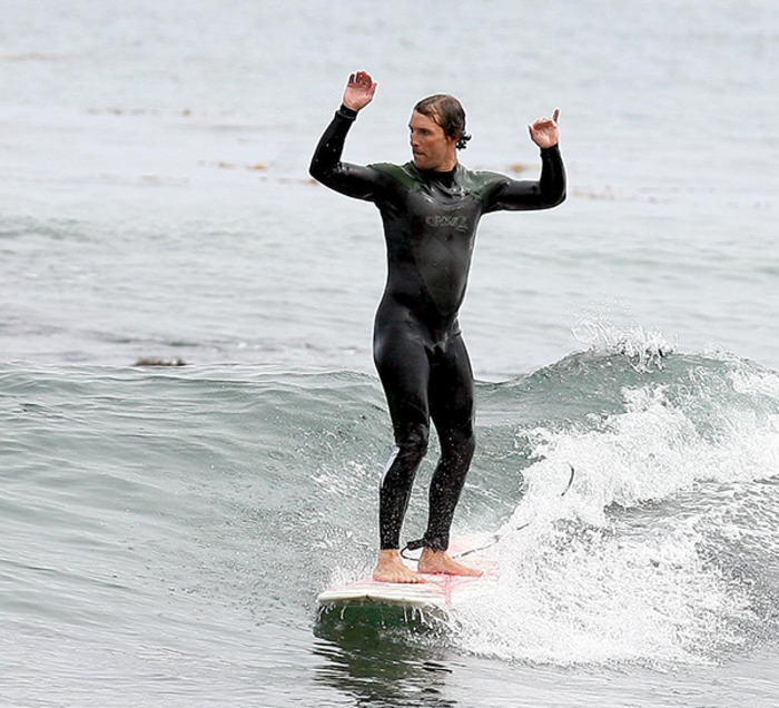 Matthew McConaughey surfing with a smile!!!